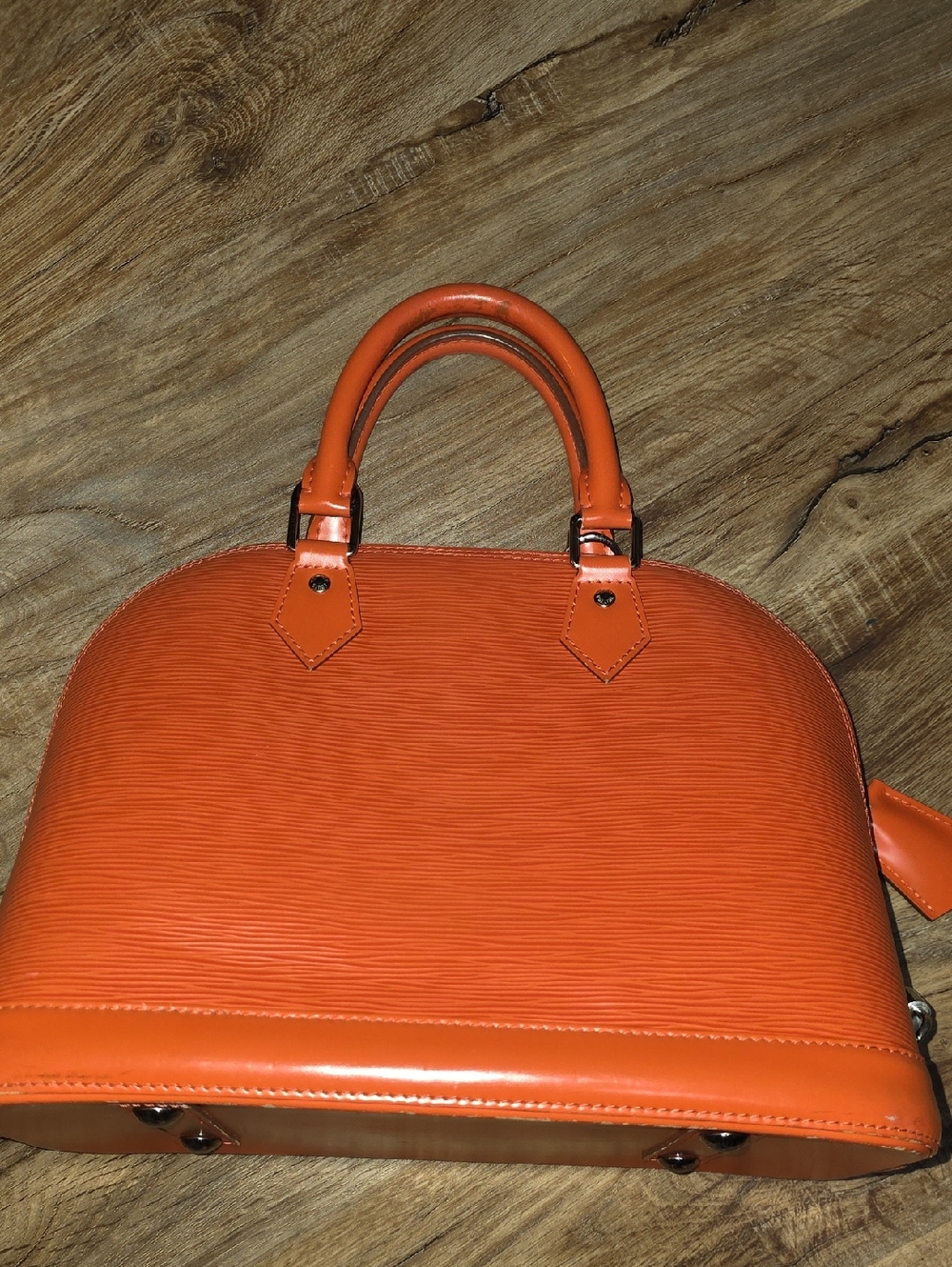 Loyis VUITTON Orange EPI ALMA